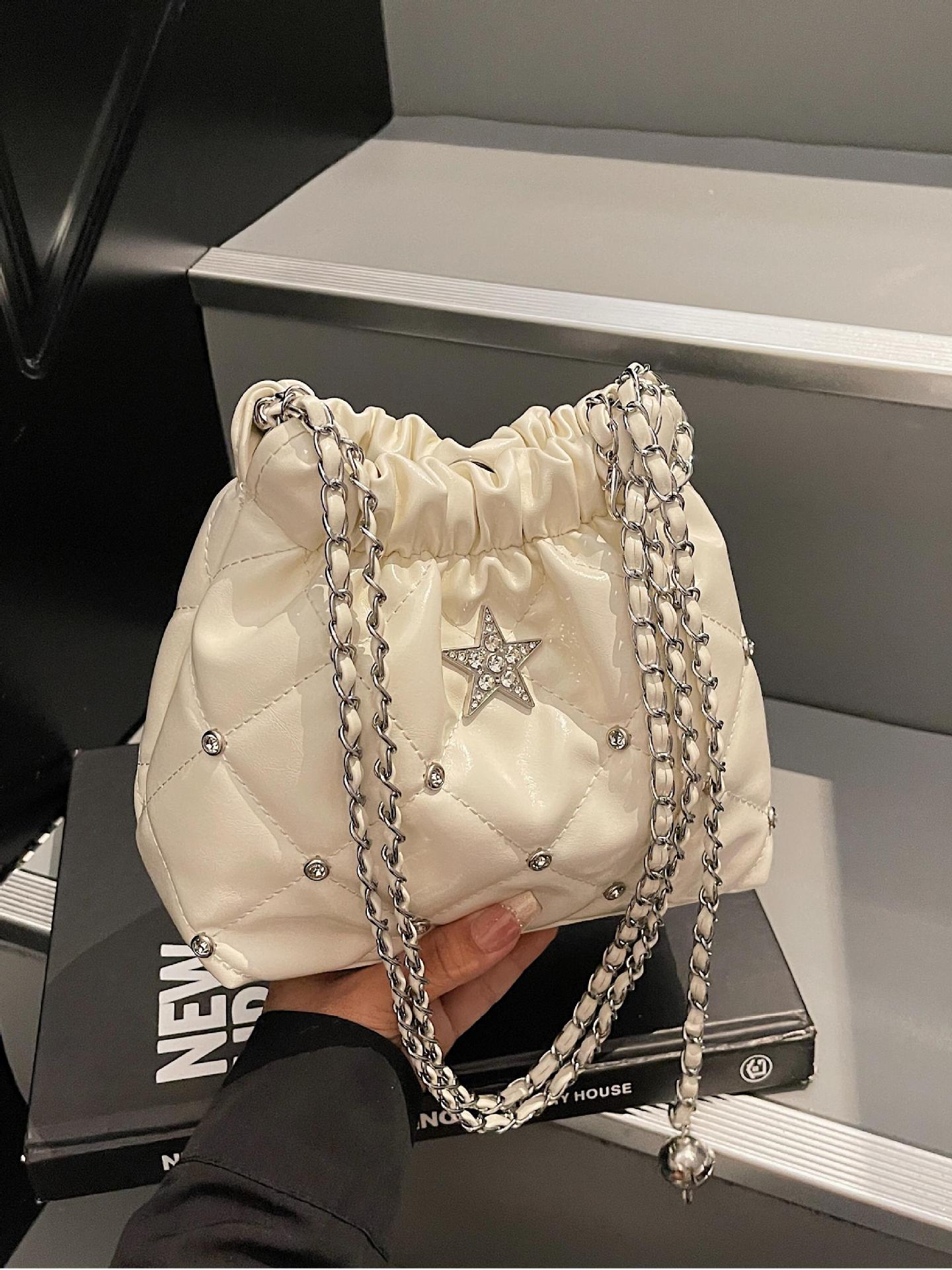 Bolso de cadena de rombos de fragancia pequeña transfronteriza para mujer 2025 nuevo estilo estilo occidental bolso de hombro de viajero salvaje bolso de cubo de mensajero