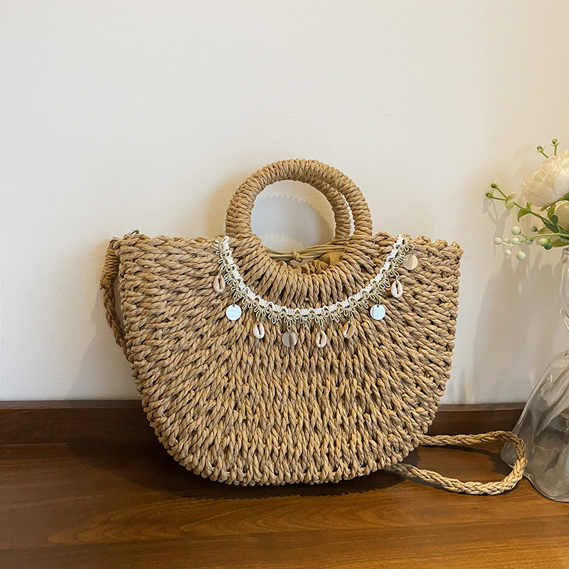 Bolso de vacaciones junto al mar 2025 verano nuevo estilo bolso de hombro de playa tejido de paja bolso de mensajero de gran capacidad mujer