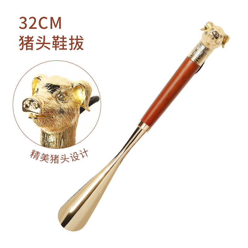 Fábrica en stock Zodiaco cabeza de cerdo de metal zapato extractor conveniente zapato dispositivo de elevación bomba de zapatos