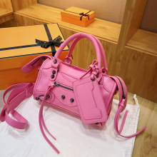 跨境2025新款机车包糖果色铆钉小包包女法式质感手提枕头包斜挎包