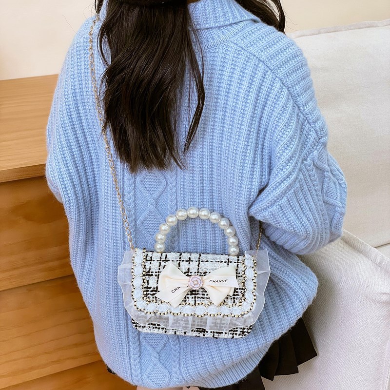 Mini-moletera de perlas de moda para niñas 2025, nueva moda coreana a cuadrillas, bolsos para niñas, ropa para niños