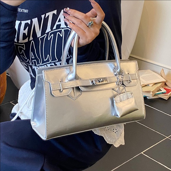 Bolso de brazo de la sensación cotidiana para mujeres 2026 nuevo nicho coreano bolso especial, moda casual, bolso de hombro universal
