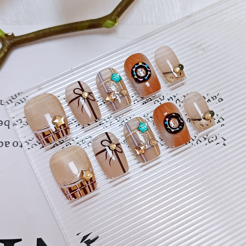 Arco a cuadrillas para usar uñas cortas, donut de diamante de estrella, manicura exquisita, 10 piezas de manicura falsa de ojo de gato.