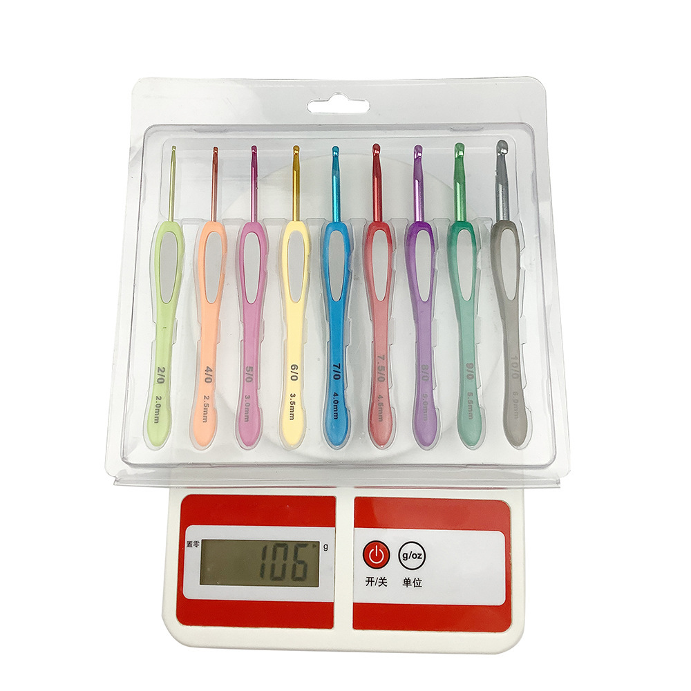 Herramientas de tejido aguja de suéter mango de plástico de color pegado aguja de acero conjunto completo 17 bolsas antideslizantes