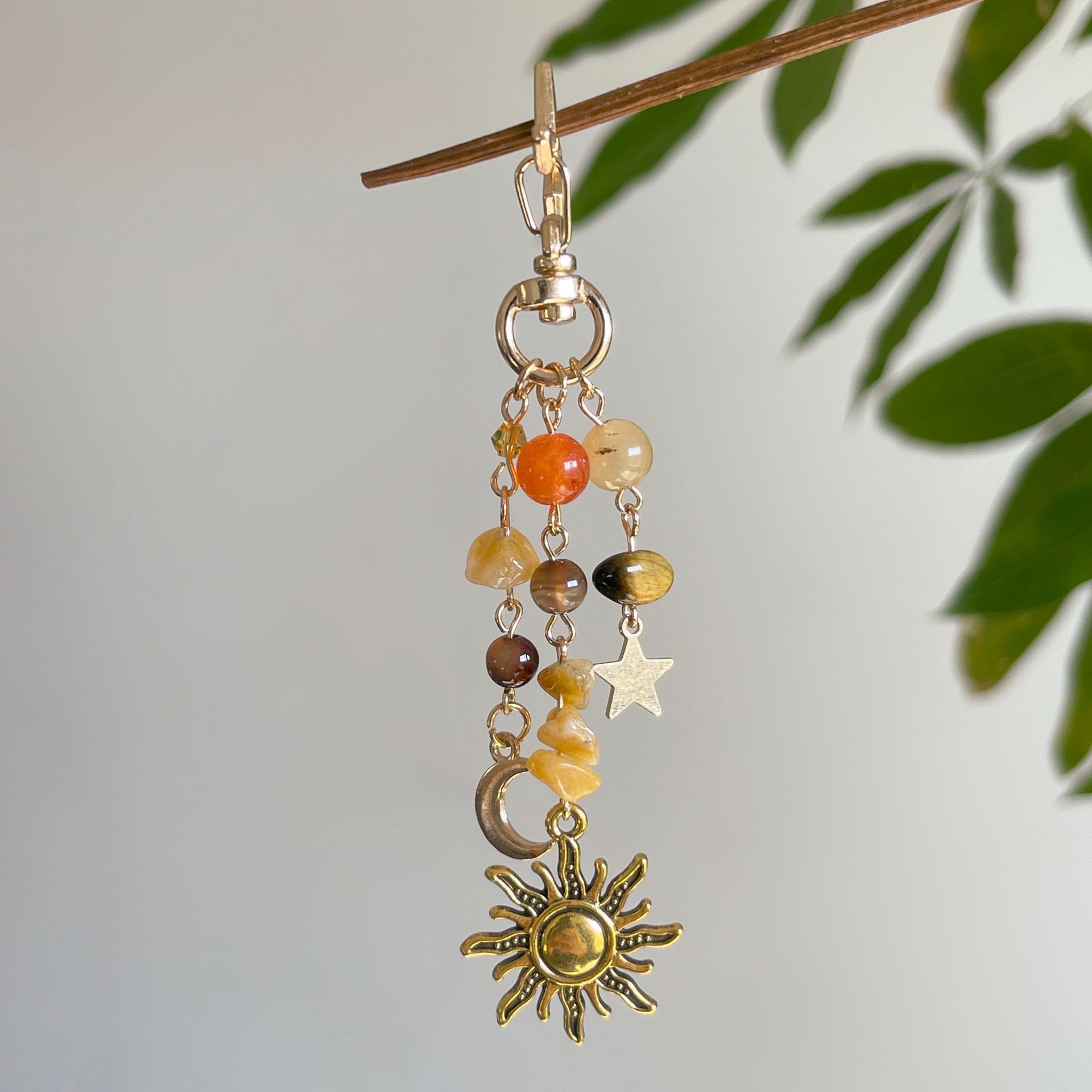 Moon And Sun Irregular Stone Keychain With Butterfly Pendant_voghion.com