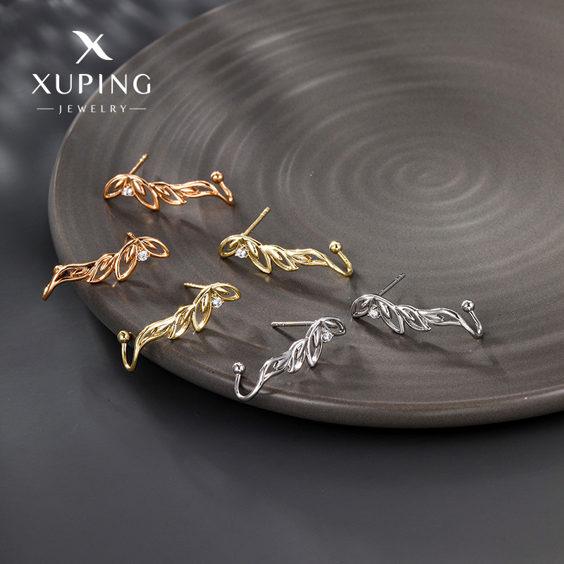 Pendientes de mariposa simétricos con gemas artificiales electrochapadas en aleación de Xuping, diseño de nicho, pendientes de alta gama para mujer