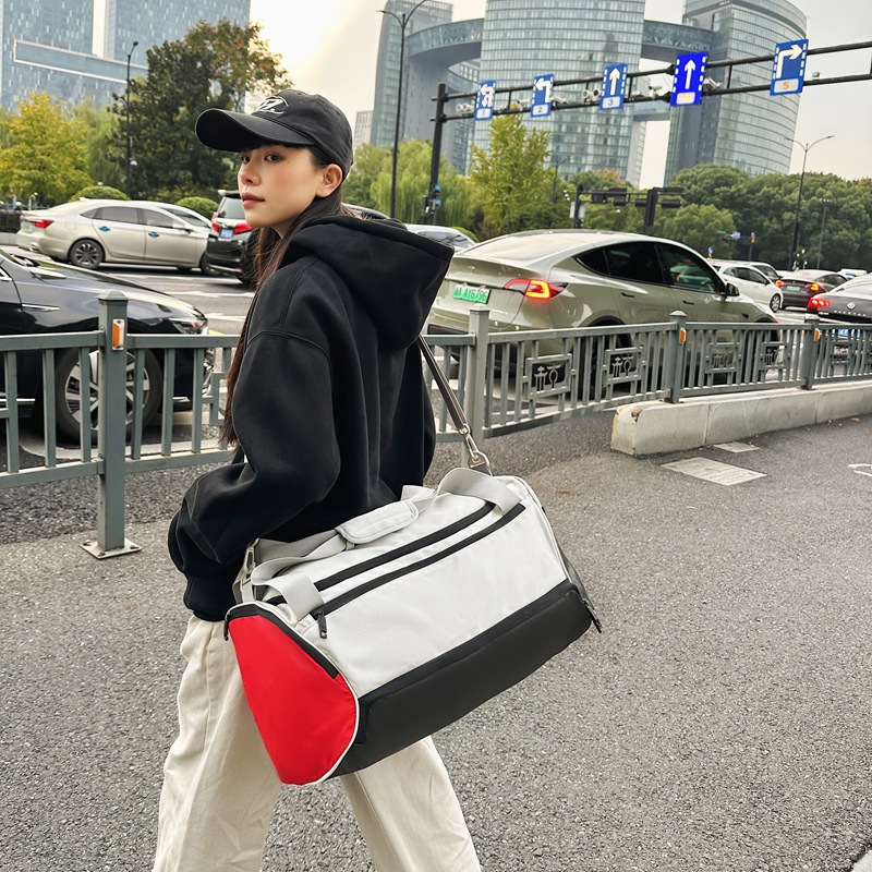 Diseño sentido de color a juego bolsa de fitness deportiva de pareja marca de moda bolso de mensajero portátil para hombre bolso de viaje de ocio de gran capacidad