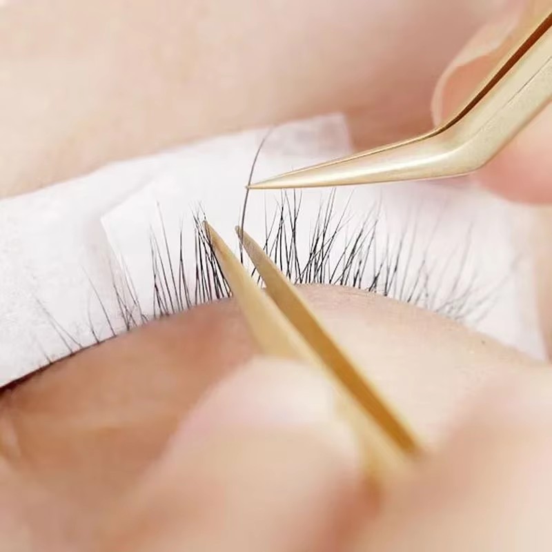 Venta al por mayor Injerto de pestañas cinta japonesa plantación de aislamiento de pestañas tela no tejida con agujeros cinta transpirable cinta de pestañas