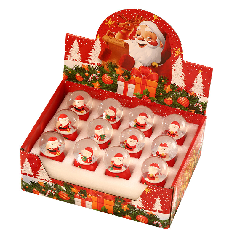 Una variedad de regalos de decoración de Navidad Navidad iluminante bola de cristal caja de música ventana diseño de velas lámparas de viento árbol de Navidad