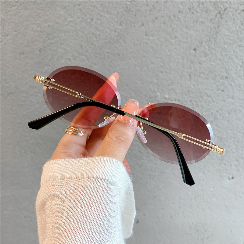 New Sunglasses Women's Oval Gradient Sunglasses Frameless Cutting Edge Trendy Glasses_voghion.com