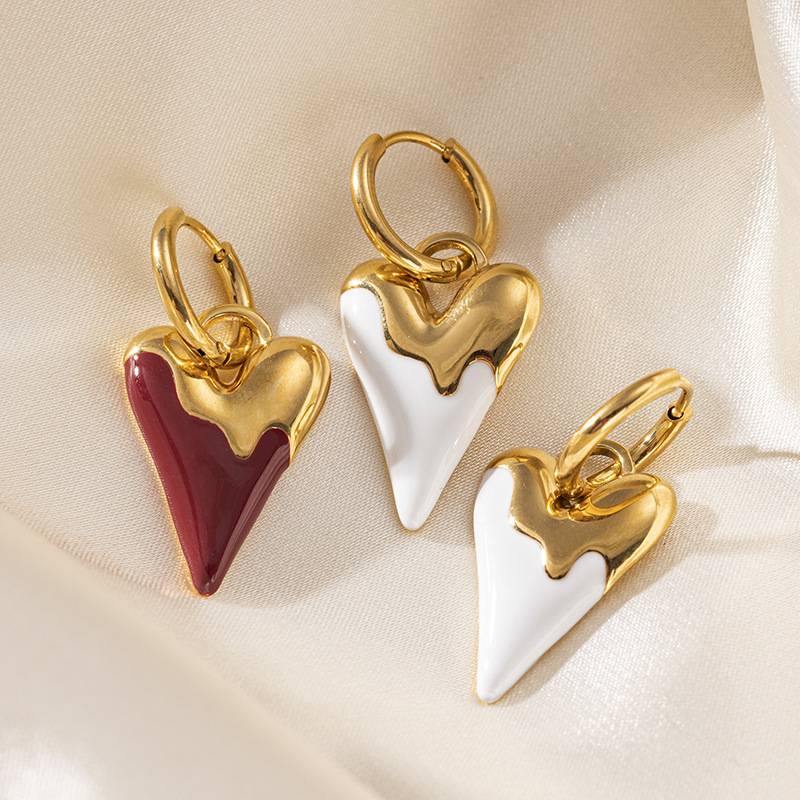TENA Europa y los Estados Unidos de moda auriculares de acero inoxidable lujo ligero alto amor 18k oro titanio acero goteo de aceite INS ventana mujer
