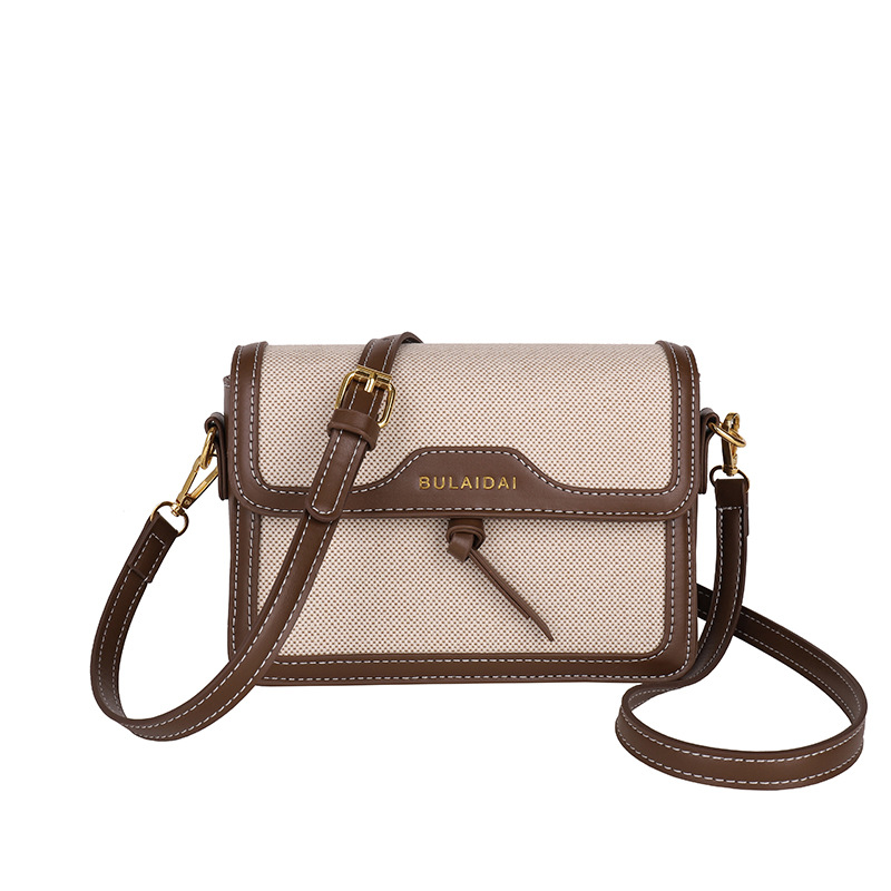 Bolsos de lujo ligero de alta calidad para mujeres 2026 comercio exterior nuevo lienzo retro empalme multi-bolsillo multicapa bolso de mochila