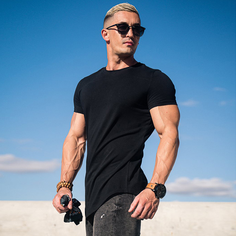 men's solid sports cotton breathable T-shirt with a round collar for…