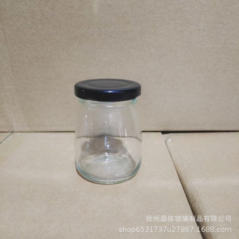卸売り100mlガラス布丁瓶厚手牛乳カップ耐高温ヨーグルト瓶木栓ガラス瓶許瓶瓶