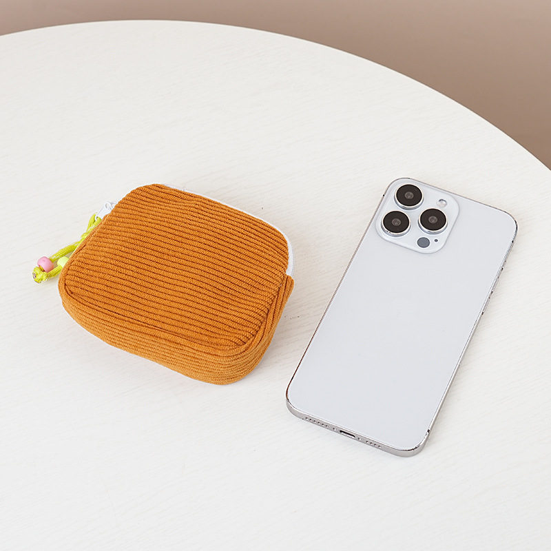 Nuevo bolso de cosméticos transfronterizo, bolso de almacenamiento de maquillaje de pana, monedero de estilo femenino, almacenamiento de toallas sanitarias, bolso portátil