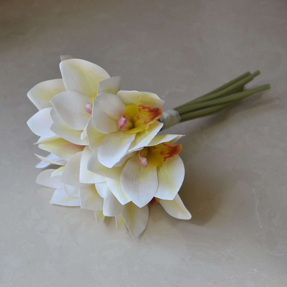 cymbidiums with bunches and flowers in hand, home model room decoration, dining table and coffee table decorations, fake flowers_voghion.com