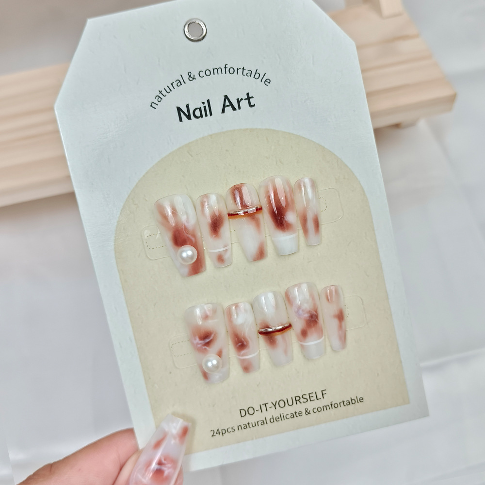 Arte de uñas al por mayor para Año Nuevo, arte de uñas hecho a mano con tendencia nacional roja del Año de la Serpiente, pegatinas de uñas con efecto ojo de gato y fuegos artificiales con un toque de alta gama.