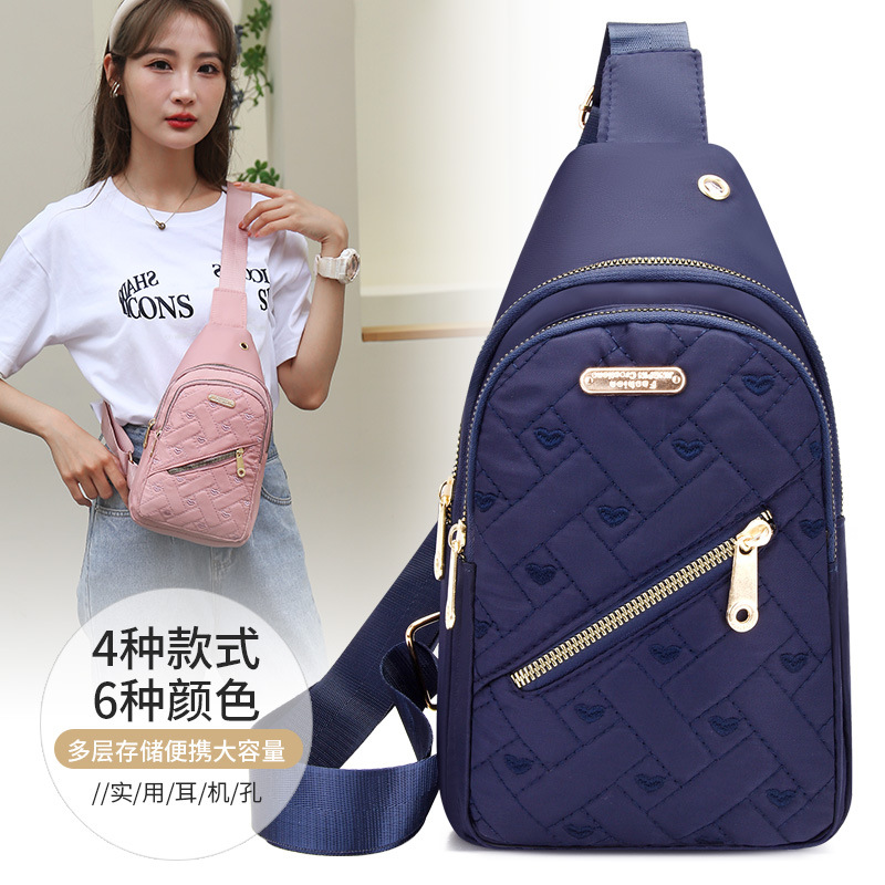 Estilo coreano simple bolsa de pecho de las mujeres nuevo multi-capa de hilo bordado de gran capacidad bolsa de pecho de mediana edad mamá bolsa de mensajero casual