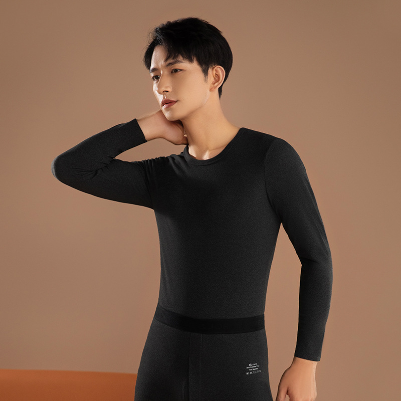 Ropa interior térmica de los hombres Calzoncillos largos finos de calefacción sin costuras traje de los hombres jóvenes de color sólido cuello redondo terciopelo Calzoncillos largos