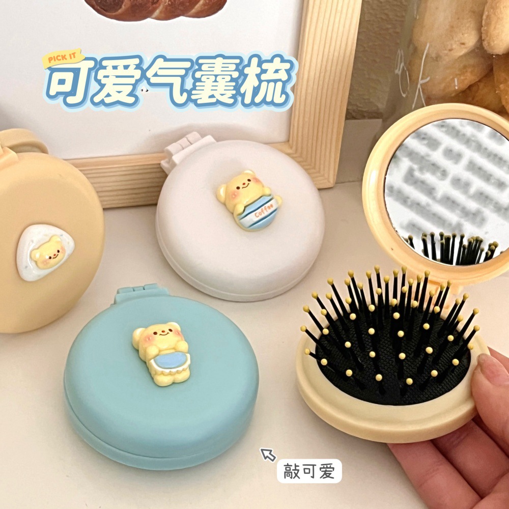 Caricatura encantadora oso plegable un solo espejo pein de corazón de niña portátil mini pequeño espejo de maquillaje de aire pantalon