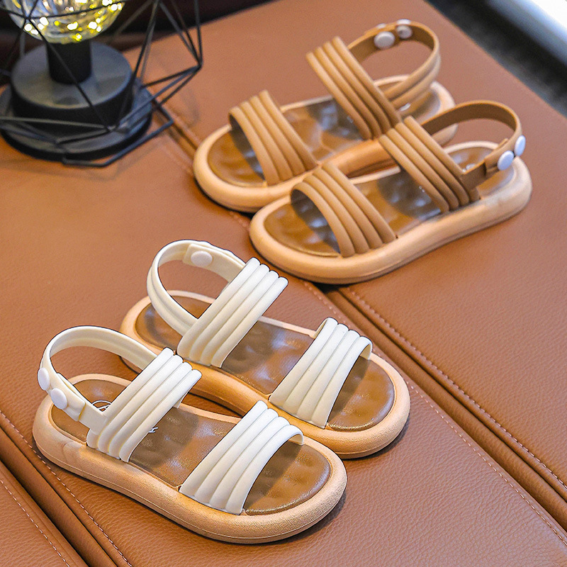 Niños sandalias de niñas de verano nuevo estilo de moda princesa coreana estudiantes lindas sandalias de aire exterior versátiles