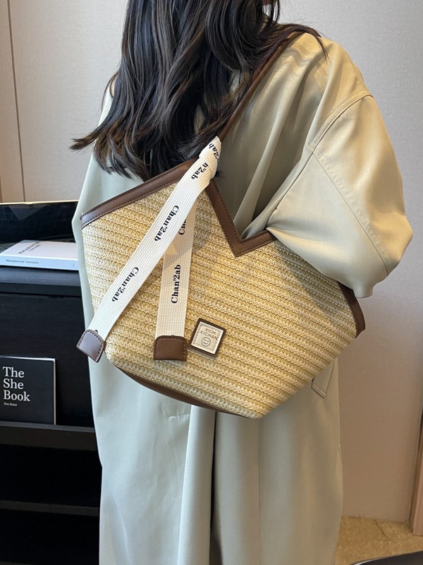 Bolsa de paja trenzada para mujeres verano 2026 nuevo paquete de hombro versátil de gran capacidad textura popular bolsa de viaje
