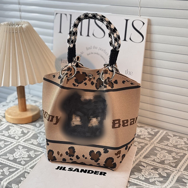 Selección estricta de la calidad del sudeste asiático de punto bolsas de bucle portátiles de gran capacidad para salir al trabajo bolsas de mano de viaje bolsas pequeñas