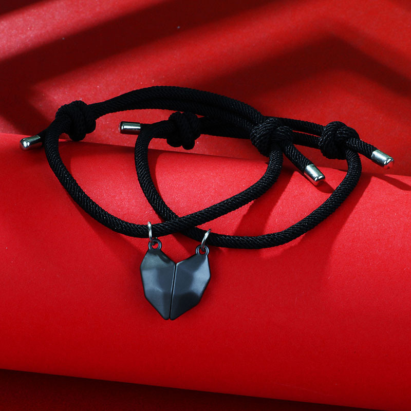 Nuevo amor blanco y negro transfronterizo deseando piedra pulsera de pareja desgarrador costura succión magnética tejida cuerda de mano ajustable hombres y mujeres
