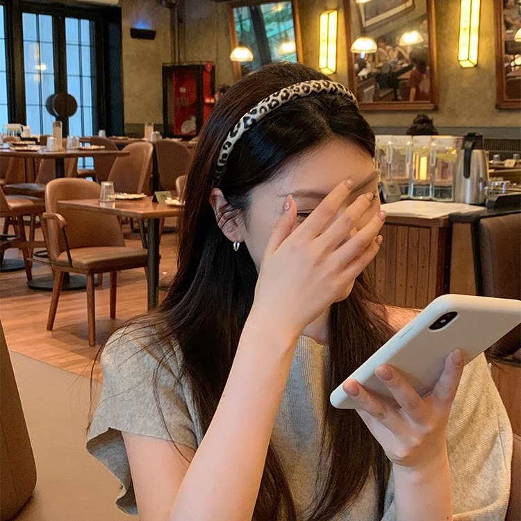 Nuevo estilo coreano de alta calidad estampado de leopardo hermoso banda de tela esponja textura de moda banda de cabeza de cráneo alto accesorios para el cabello