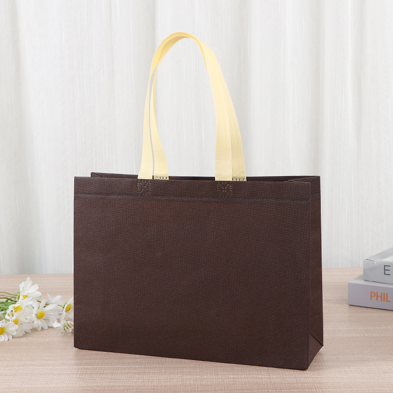 Bolsas de tela no tejida tiendas de souvenirs de viajes de madres y bebés en línea bolsa de compras de mano engrosada bolsa de mano image 11