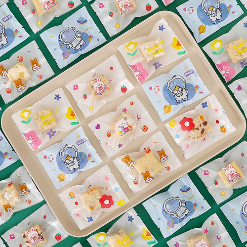 Cloudberry cookie packaging machine self-adhesive bag machine sealing snowflake snack small bags baking dairy jujube packaging bags