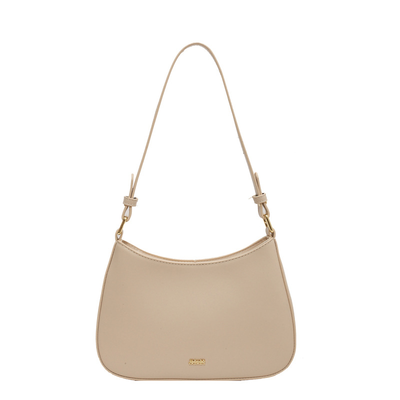 Bolso de moda de mujer 2024 verano nuevo estilo de moda bolso de brazo francés de textura simple bolso de palo nicho bolso de mochila