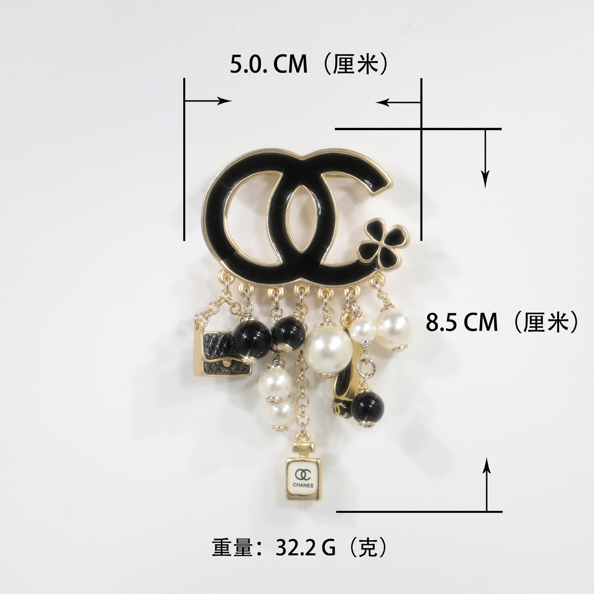 Fashion Light Luxury Style Chanel Style Double C Black Enamel Clover Bag Pearl Tassel Pendant Women's Decorative Brooch