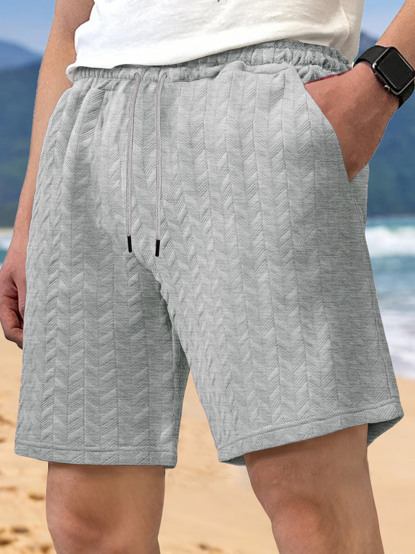 Europa y Estados Unidos ropa de hombre transfronteriza spot verano suelta pantalones cortos de color sólido jacquard correa de hombre casual pantalones cortos de playa