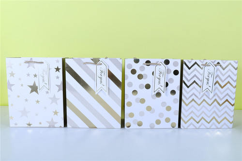 Hot gold white card gift packaging bag five-pointed star shopping bag Polish pattern series paper bag wholesale gift bag