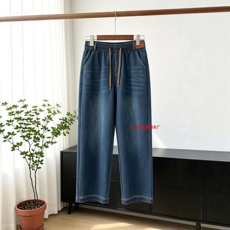 Autumn high-waisted washed cotton denim wide-leg pants for women, loose and slimming, with a flowing straight-leg design, elastic waistband, and drawstring