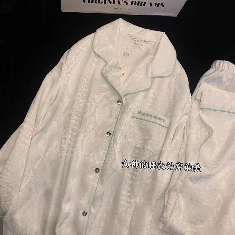 Pajamas de pareja de alto nivel de primavera y otoño de seda hielo pantalones de manga larga de alto nivel de hombre imitación de seda ropa de verano