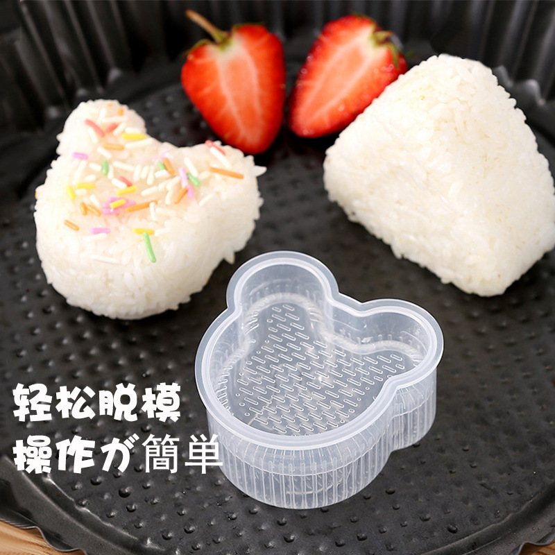 漫画の子供のおにぎりの鋳型の海苔のご飯の三角のおにぎりの食品級のppの材質の焙煎してツールの卸売りを作ります。|undefined