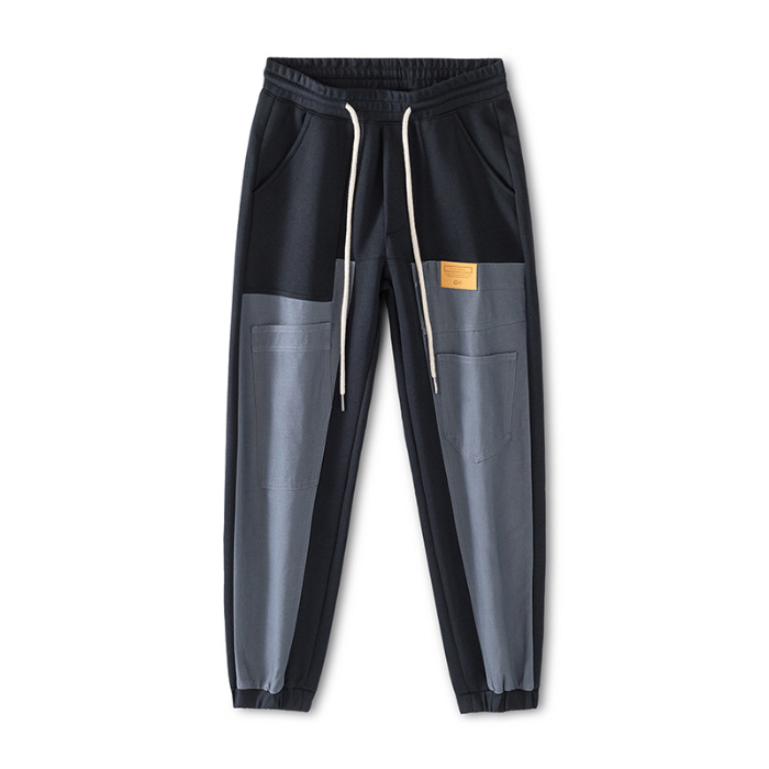 Mick Jones 2025, nuevos pantalones casuales de otoño, pantalones de guardia de hombre, pantalones grandes, pantalones de moda con etiquetas colgantes.