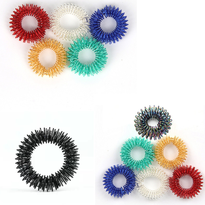 Mini spring decompression finger massage ring finger massager mini…