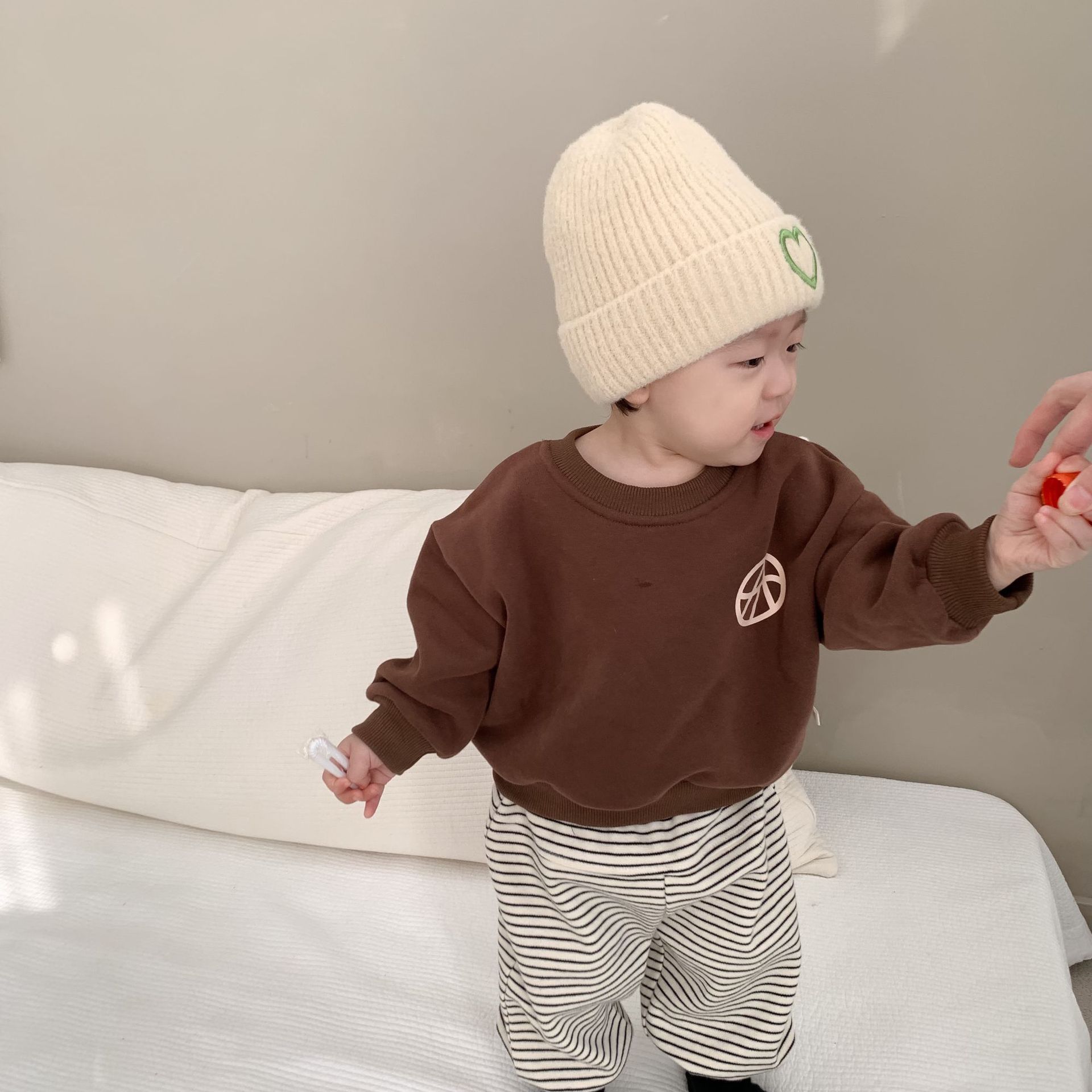 Bebé otoño e invierno más suéter de terciopelo bebé blusa engrosada versión coreana de ropa infantil ropa infantil invierno ropa infantil ropa protectora de cabeza