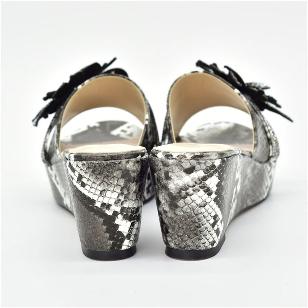 Snakeskin wedge sandals with round toe and three-dimensional applique embellish clutch shoe bag_voghion.com