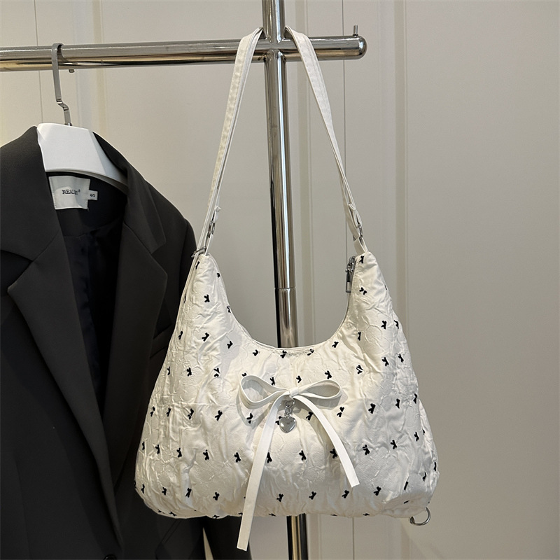 Boom lazo sensación de gran capacidad bolso de hombro para mujeres 2025 nuevo estilo mochila de estilo de viaje al campus mochila