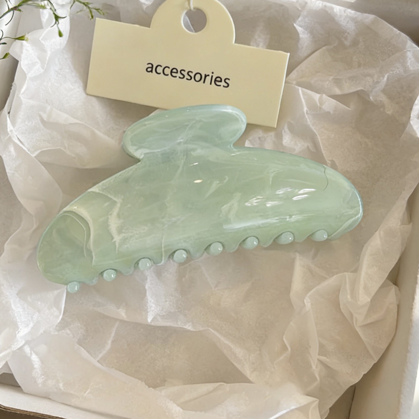 Smudged oval mint green