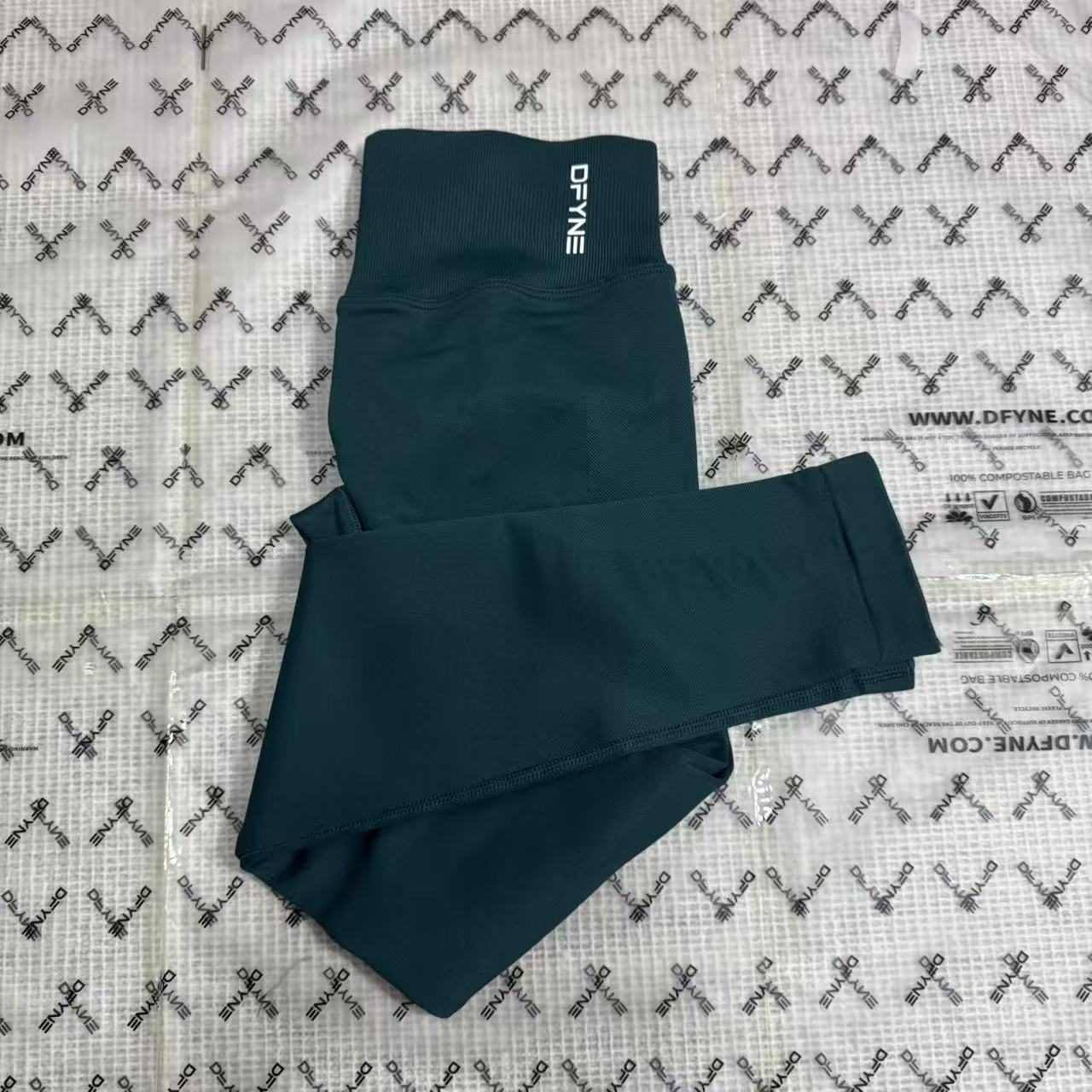Aliexpress nuevo DFYNE mangas cortas mate nylon alta elástica cuerpo apretado sin bordas de acondicionamiento deportivo T mangas cortas