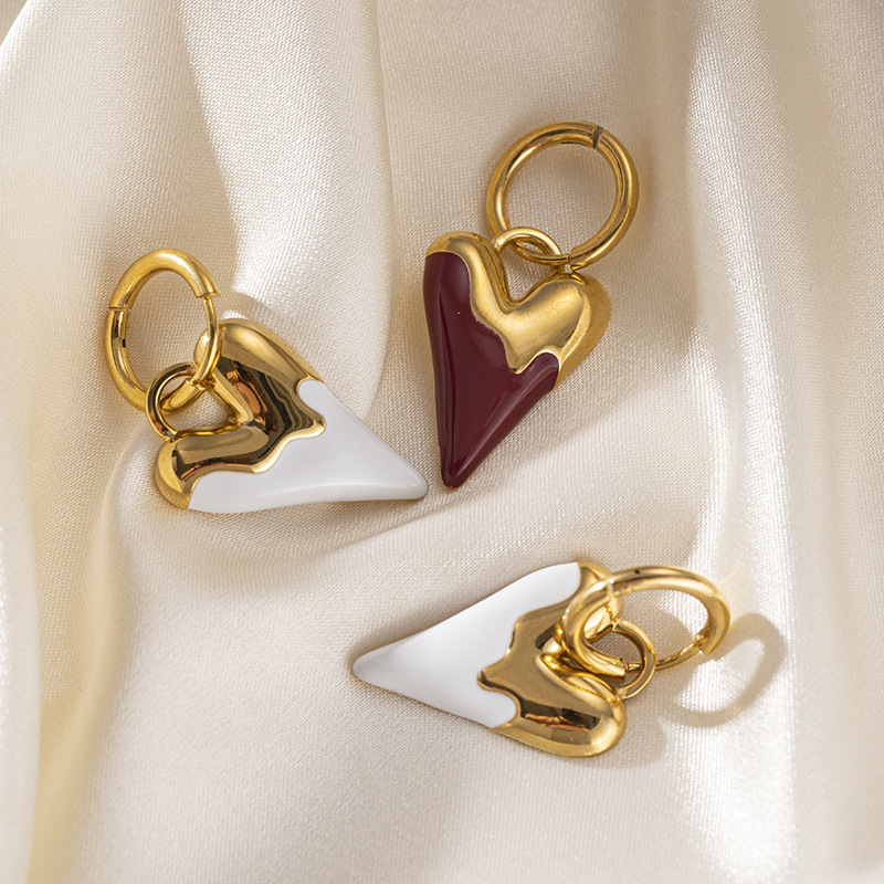 TENA Europa y los Estados Unidos de moda auriculares de acero inoxidable lujo ligero alto amor 18k oro titanio acero goteo de aceite INS ventana mujer