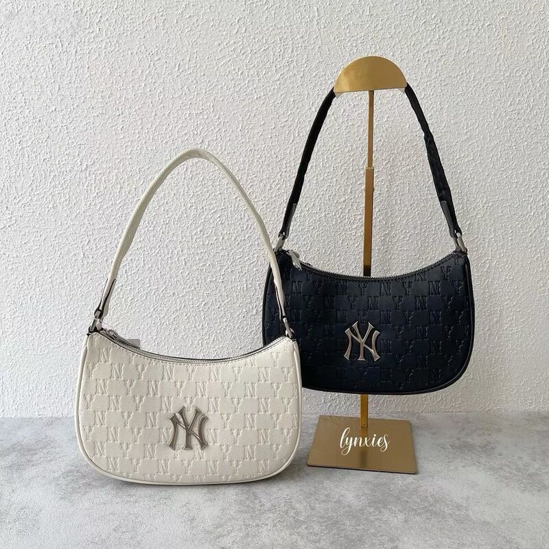 New Korean MLB underarm bag with all-over letter print, metal NY dumpling bag, handbag, shoulder bag, high-end, trendy, and popular among influencers New Korean MLB underarm bag with all-over letter print, metal NY dumpling bag, handbag, shoulder bag, high-end, trendy, and popular among influencers