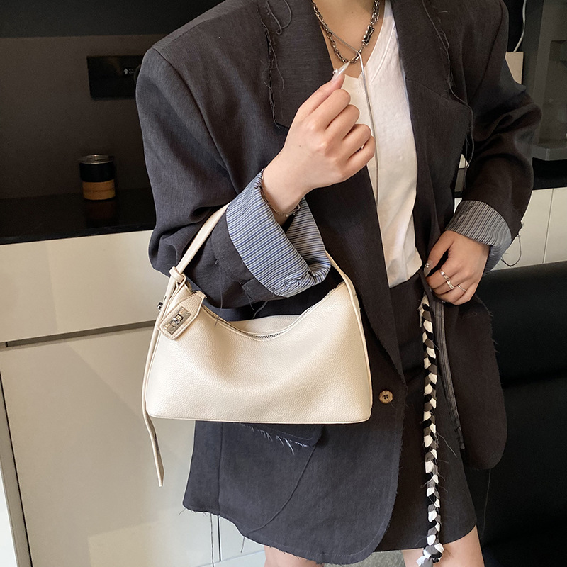 Bolsos para las axilas populares de este año 2025 primavera nuevo bolso femenino bolso fresco con patrón de lichi bolso de hombro diario