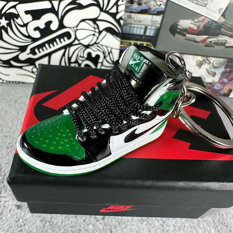 44. black and green toes + box