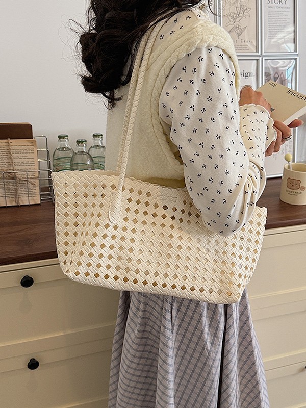 Bolsa de hombro de tejido hueco para mujeres 2026 nueva moda coreana transfronteriza bolso de madre y bebé bolso de lujo ligero